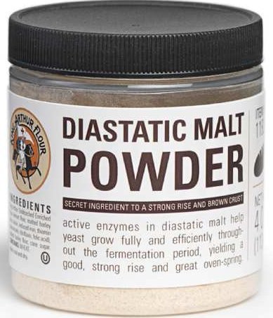 Jar of diastatic malt powder with a black lid and white label.