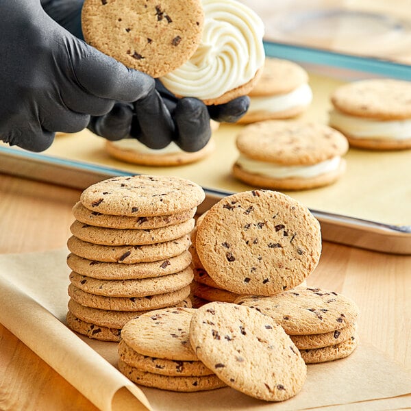 perfect for use as the end pieces in a mouthwatering chocolate chip cookie ice cream sandwich or as a sweet, crunchy cookie layer within your next ice cream cake. These chocolate chip cookie wafers add flavor to pies, cakes, or even serve as a stand-alone cookie with coffee for a light alternative.