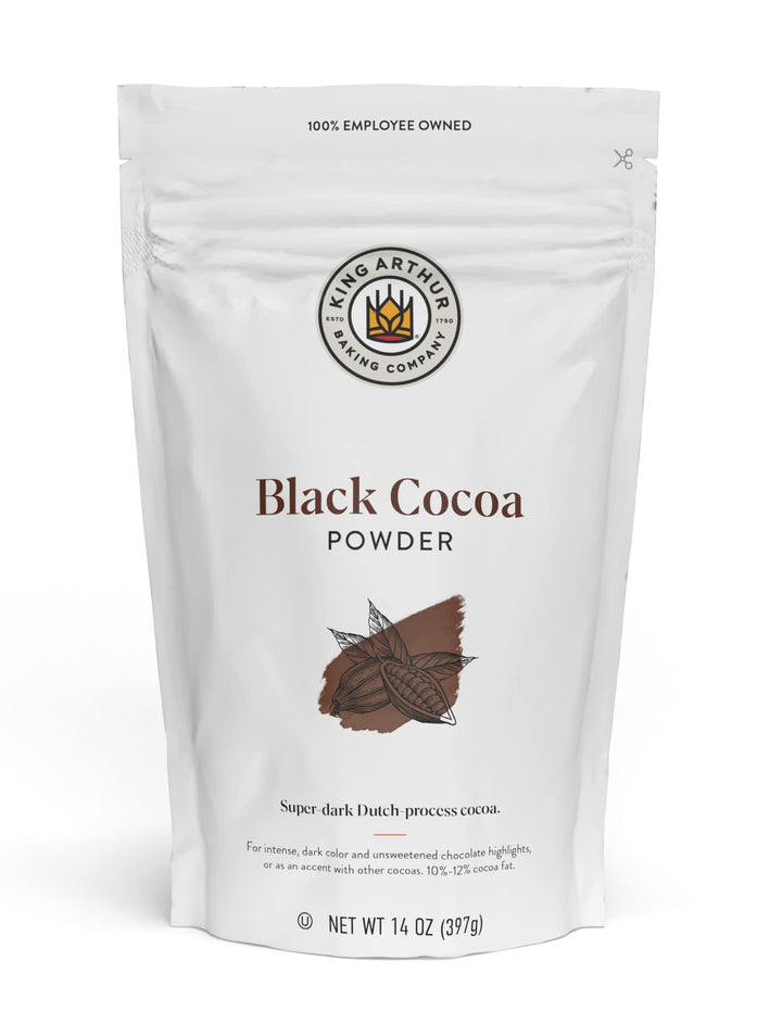 Bag of King Arthur Black Cocoa Powder on a white background