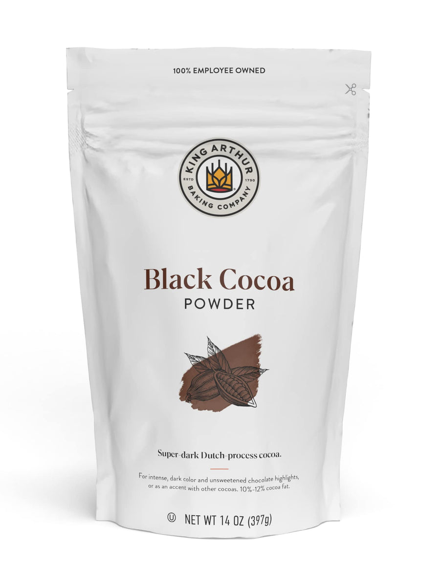 Bag of King Arthur Black Cocoa Powder on a white background