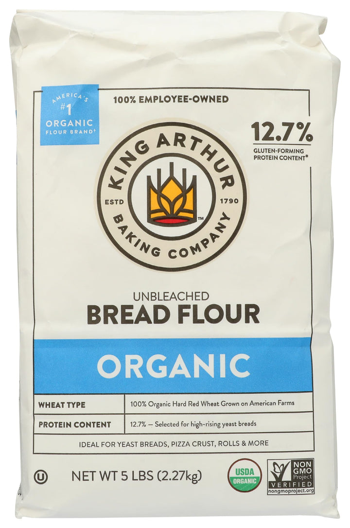 Bag of King Arthur Organic Unbleached Bread Flour with branding and product details.