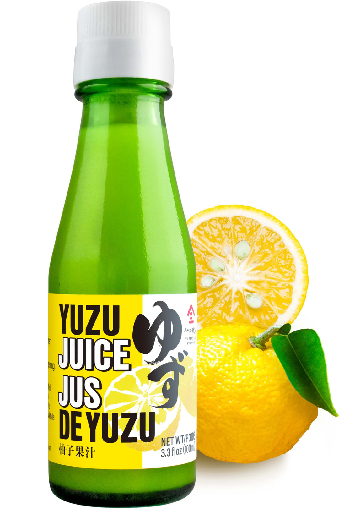 Bottle of yuzu juice with a slice of yuzu fruit on a white background