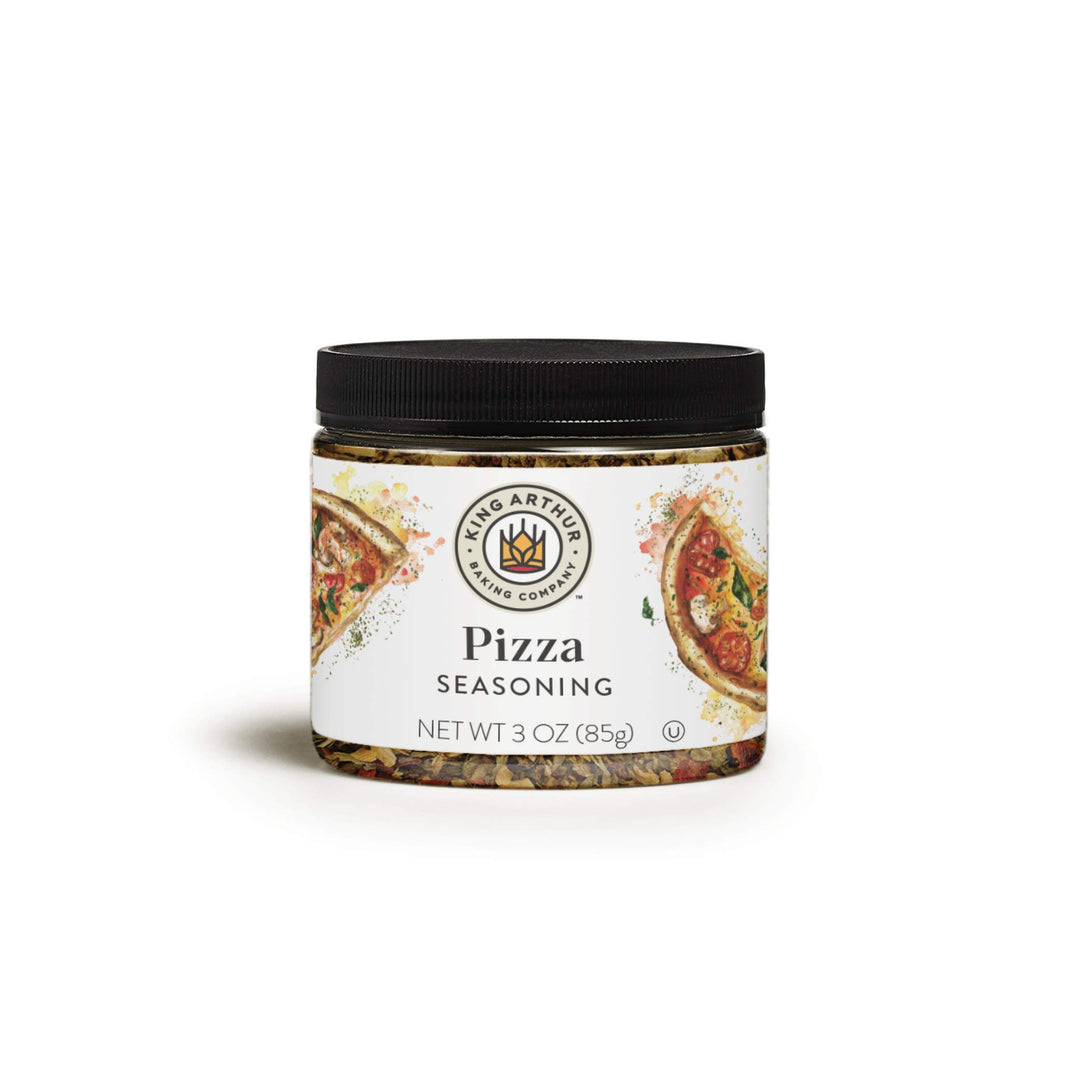 Jar of pizza seasoning with a visible brand logo on a white background