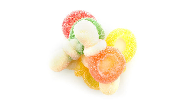 Colorful gummy candies on a white background