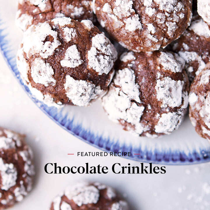 Chocolate crinkle cookies on a plate with 'Featured Recipe: Chocolate Crinkles' text.