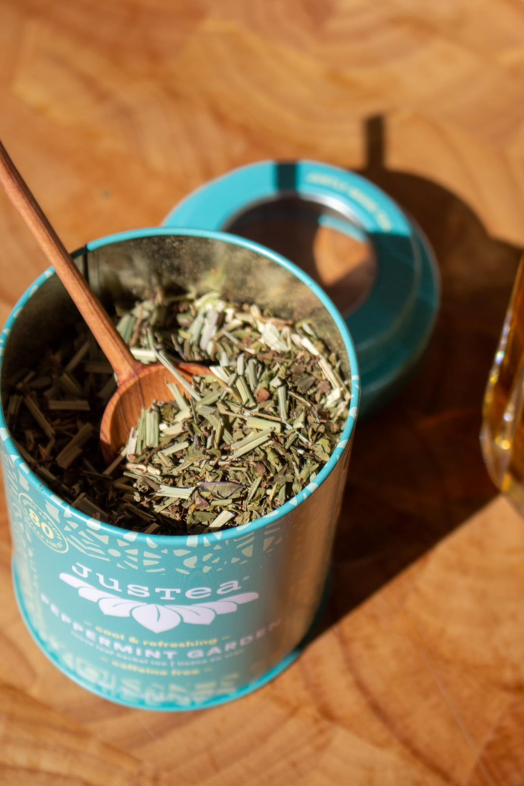 JusTea Peppermint Garden Loose Leaf Herbal Tea | Tin with Hand-Carved Spoon | 40+ Cups (45g) | Caffeine-Free | Award-Winning | Fair Trade - Canadian Distribution - Ships Free Within Canada on Orders Above CAD $199