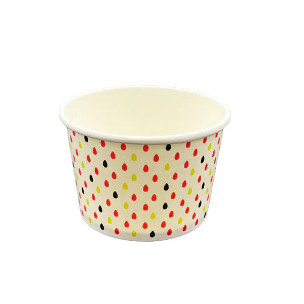Paper cup with polka dot pattern on a white background