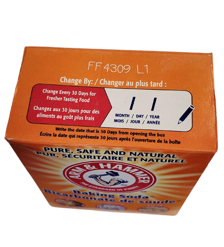 Arm & Hammer baking soda box with orange packaging and visible branding.