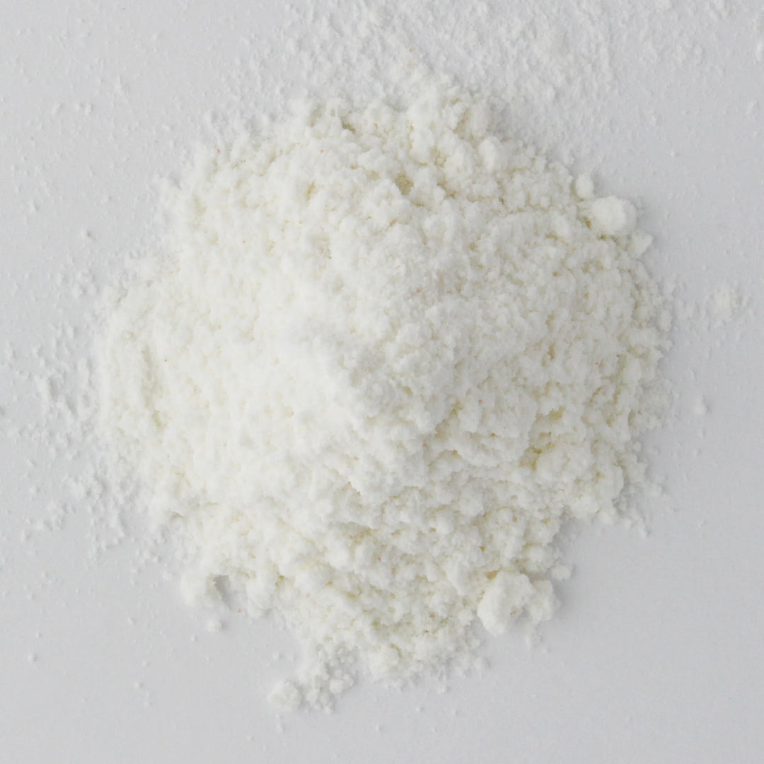 Close up of waffle powder substance on a light gray background