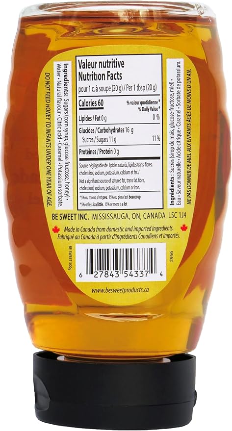 Honey bottle with nutrition facts label on a white background