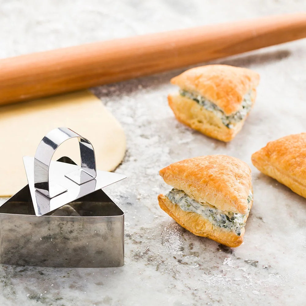 Restaurantware Pastry Tek Stainless Steel Triangular Pastry Ring Mold, With Press, 3.3 X 1.5In - Restaurant Equipment and Smallwares - Canadian Distribution - Ships Free Within Canada on Orders Above CAD $199