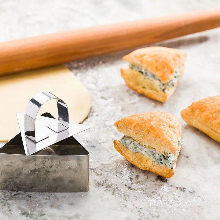 Restaurantware Pastry Tek Stainless Steel Triangular Pastry Ring Mold, With Press, 3.3 X 1.5In - Restaurant Equipment and Smallwares - Canadian Distribution - Ships Free Within Canada on Orders Above CAD $199