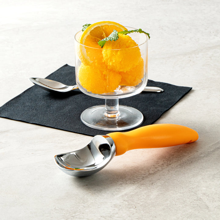 Restaurantware Comfy Grip Ice Cream Scoop, Zinc, Tangerine, 7.75 x 2 x 1.75In - Restaurant Equipment and Smallwares - Canadian Distribution - Ships Free Within Canada on Orders Above CAD $199