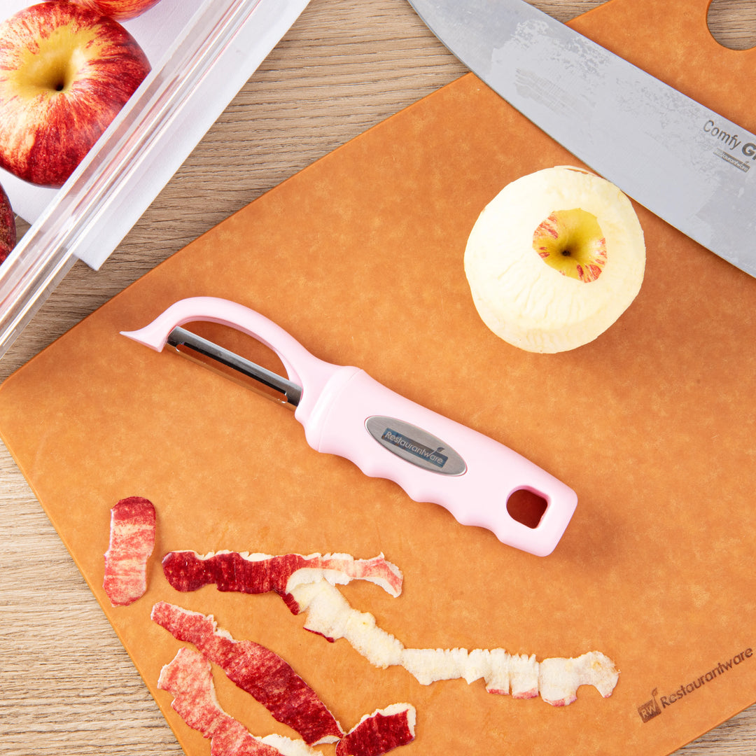 Restaurantware Comfy Grip 7.50In Stainless Steel Vegetable Peeler, Pink - Restaurant Equipment and Smallwares - Canadian Distribution - Ships Free Within Canada on Orders Above CAD $199