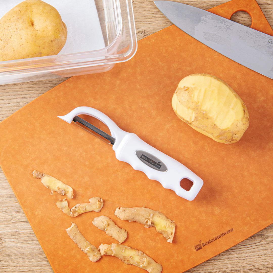 Restaurantware Comfy Grip 7.50In Stainless Steel Vegetable Peeler, White - Restaurant Equipment and Smallwares - Canadian Distribution - Ships Free Within Canada on Orders Above CAD $199