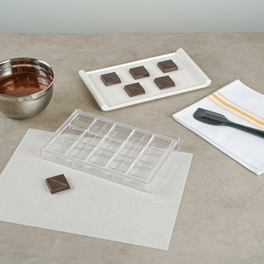 Restaurantware Pastry Tek 15-Compartment Square with Lines Candy & Chocolate Molds, Polycarbonate - 10 Units/Case - Restaurant Equipment and Smallwares - Canadian Distribution - Ships Free Within Canada on Orders Above CAD $199