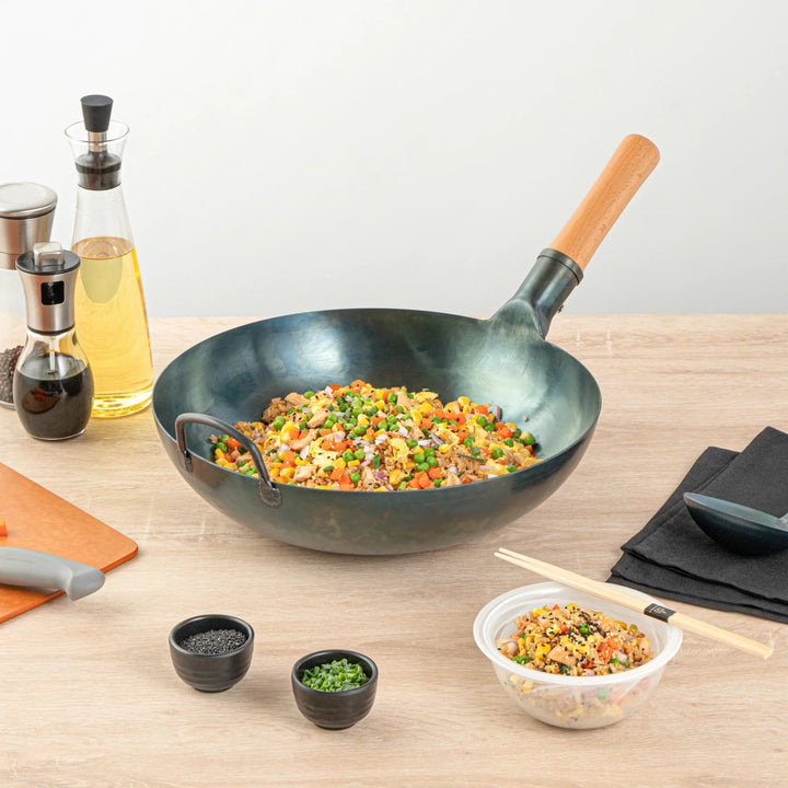 Restaurantware Motomori 14 Inch Pre-Seasoned Fry Pan, Carbon Steel, Blue, Flat Bottom, Hammered Finish, Wood Handle - Restaurant Equipment and Smallwares - Canadian Distribution - Ships Free Within Canada on Orders Above CAD $199