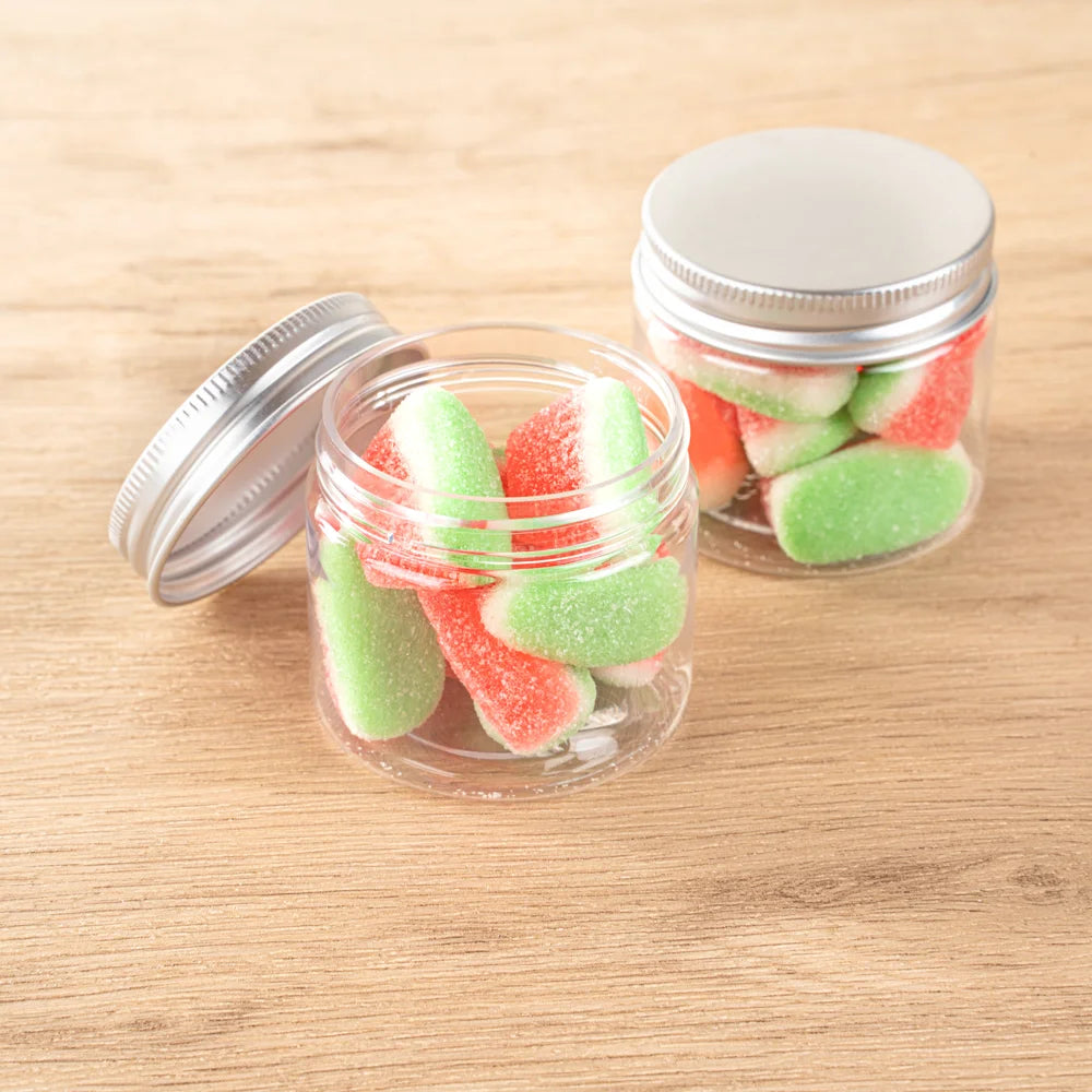 Restaurantware RW Base 2oz Clear Plastic Candy & Snack Jars, with Silver Aluminum Lid, 2 x 2 x 1.75In - Restaurant Equipment and Smallwares - Canadian Distribution - Ships Free Within Canada on Orders Above CAD $199