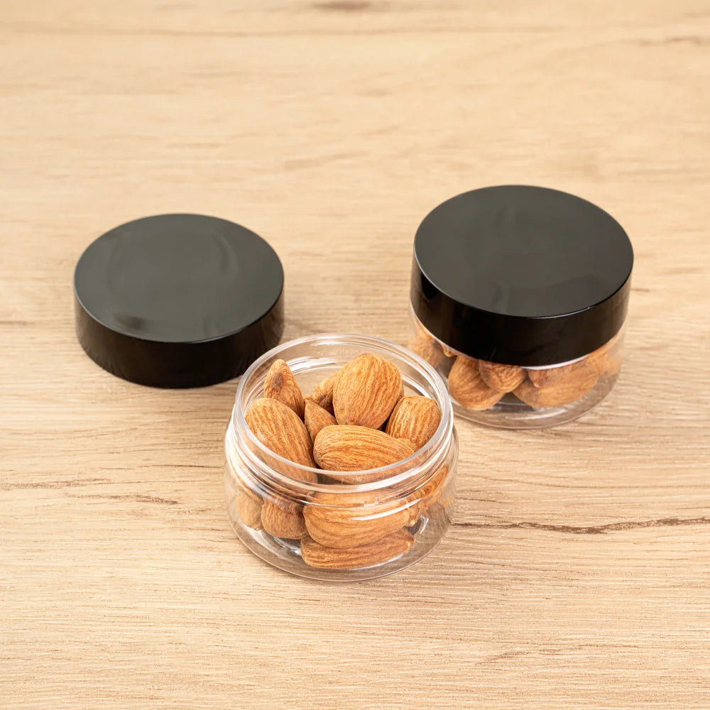 Restaurantware RW Base 1oz Clear Plastic Candy & Snack Jars, with Black Plastic Lid, 2 x 2 x 1.25In - Restaurant Equipment and Smallwares - Canadian Distribution - Ships Free Within Canada on Orders Above CAD $199