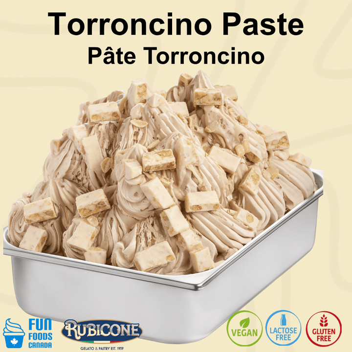 A metal tub filled with Torroncino ice cream made with paste, topped with cookie pieces, on a pale beige background with the Rubicone and Fun Foods Canada brand logos and certification badges reading vegan, lactose-free, and gluten-free. 
