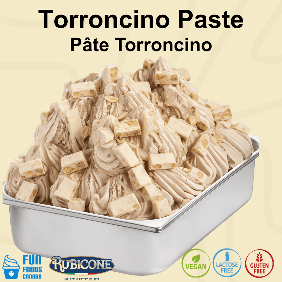 A metal tub filled with Torroncino ice cream made with paste, topped with cookie pieces, on a pale beige background with the Rubicone and Fun Foods Canada brand logos and certification badges reading vegan, lactose-free, and gluten-free. 