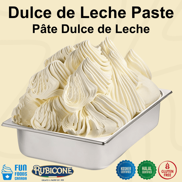 A metal tub filled with dulce de leche gelato on a pale beige background, with the text 'Dulce de Leche Paste' at the top and Rubicone and Fun Foods Canada branding plus certification badges at the bottom reading Kosher Certified, Halal Certified, and gluten-free.