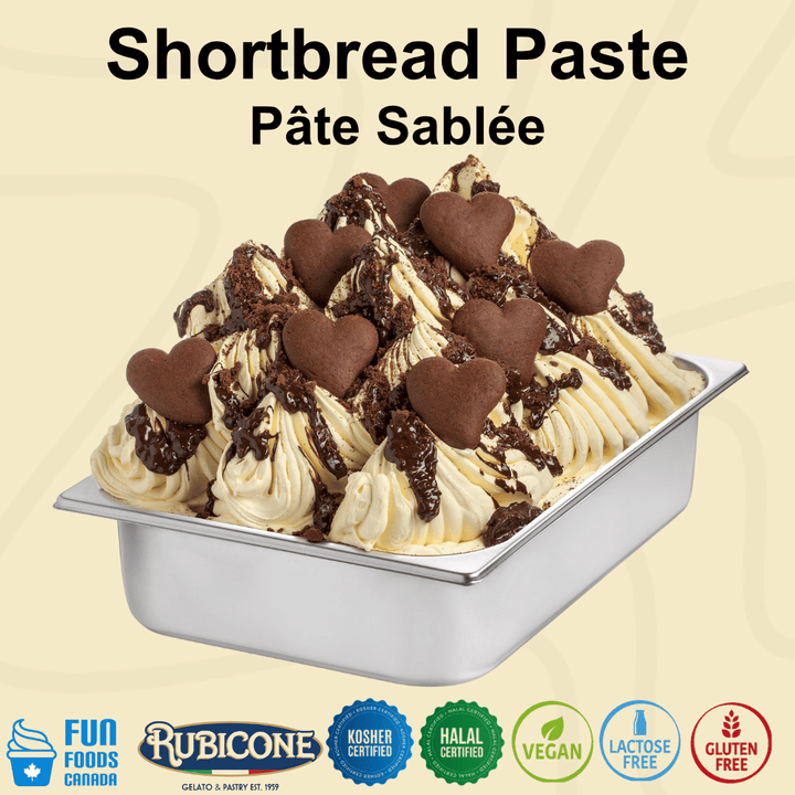 Shortbread Ice cream gelato with chocolate hearts in a wide metal gelato pan. Featuring Rubicone and Fun Foods Canada branding and certification logos: Kosher Certified, Halal Certified, Vegan, Lactose-free, Gluten-free on a beige background.