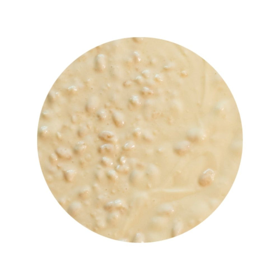Texture image of white crunch sundae dessert topping - white chocolate sauce with crunchy cereal pieces