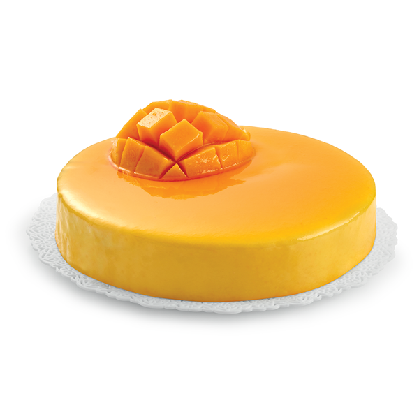 Mango cake made with mango mirror glaze on a white background