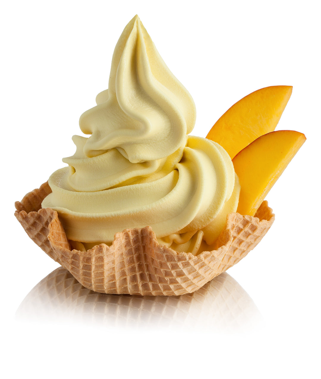 Mango soft serve gelato ice cream in a waffle cup with mango slices on a white background made with Rubicone Mango Ready Base 
