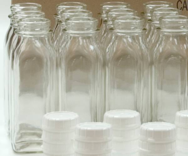 Pint (473ml) Glass Bottles (Tall) and Lids Combo Pack - 24 pint bottles and 36 white TEC 48mm lids. per case - Ships Free Within Canada