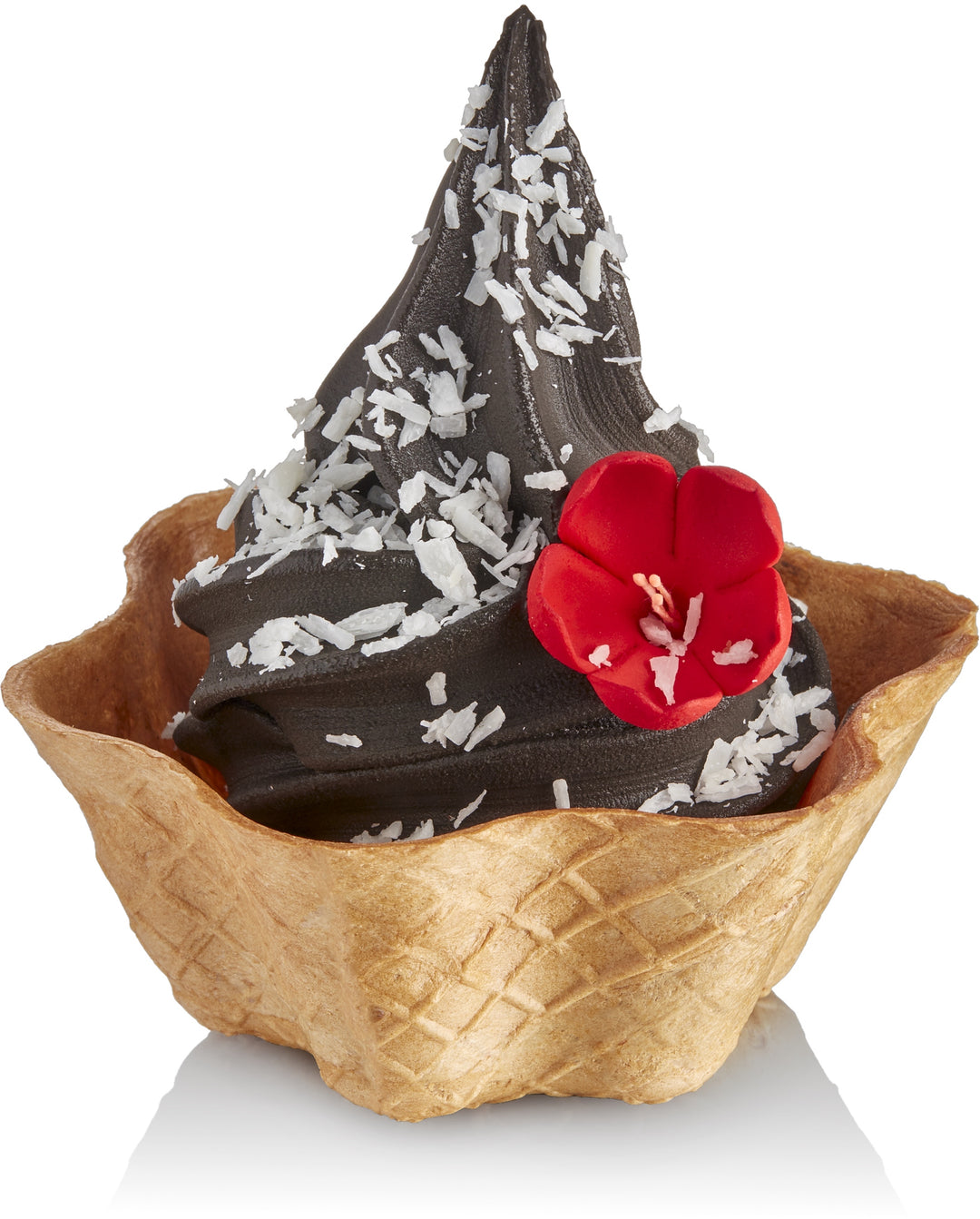 Rubicone Black Hawaii Sugarfree Vegan Soft Serve Gelato in a waffle cup with shredded coconut flakes and edible decorative flower by Rubicone Canada