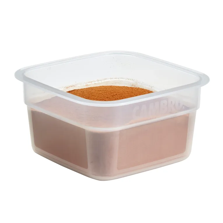 Clear plastic container with brown powder inside on a white background