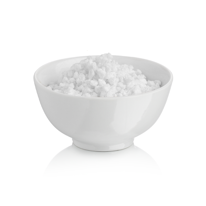 White bowl filled with Rubicone chopped meringue on a white background