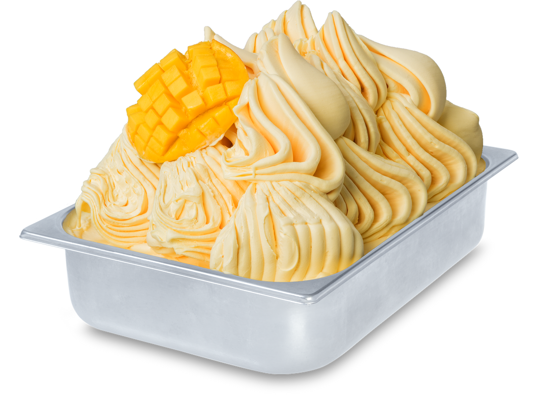 Mango Gelato in a wide stainless steel gelato pan with mango fruit pieces - made with Rubicone ready mango base 