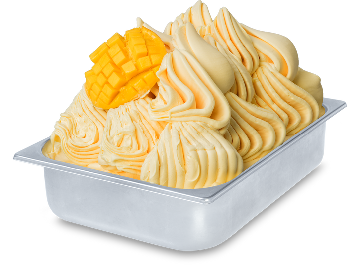 Mango Gelato in a wide stainless steel gelato pan with mango fruit pieces - made with Rubicone ready mango base 