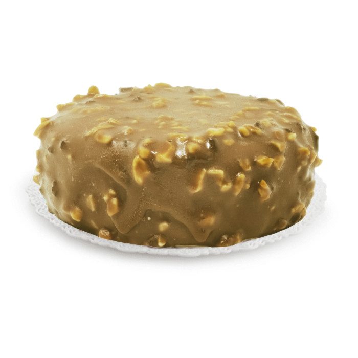 Gelato cake coated with a layer of Rubicone hazelnut crock glaze on a white background