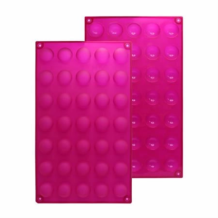 Two pink silicone mold trays with round cavities on a white background - fun foods canada