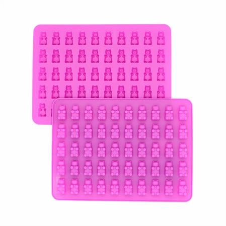 Two pink silicone molds with small gummy bear shapes on a white background - fun foods canada 